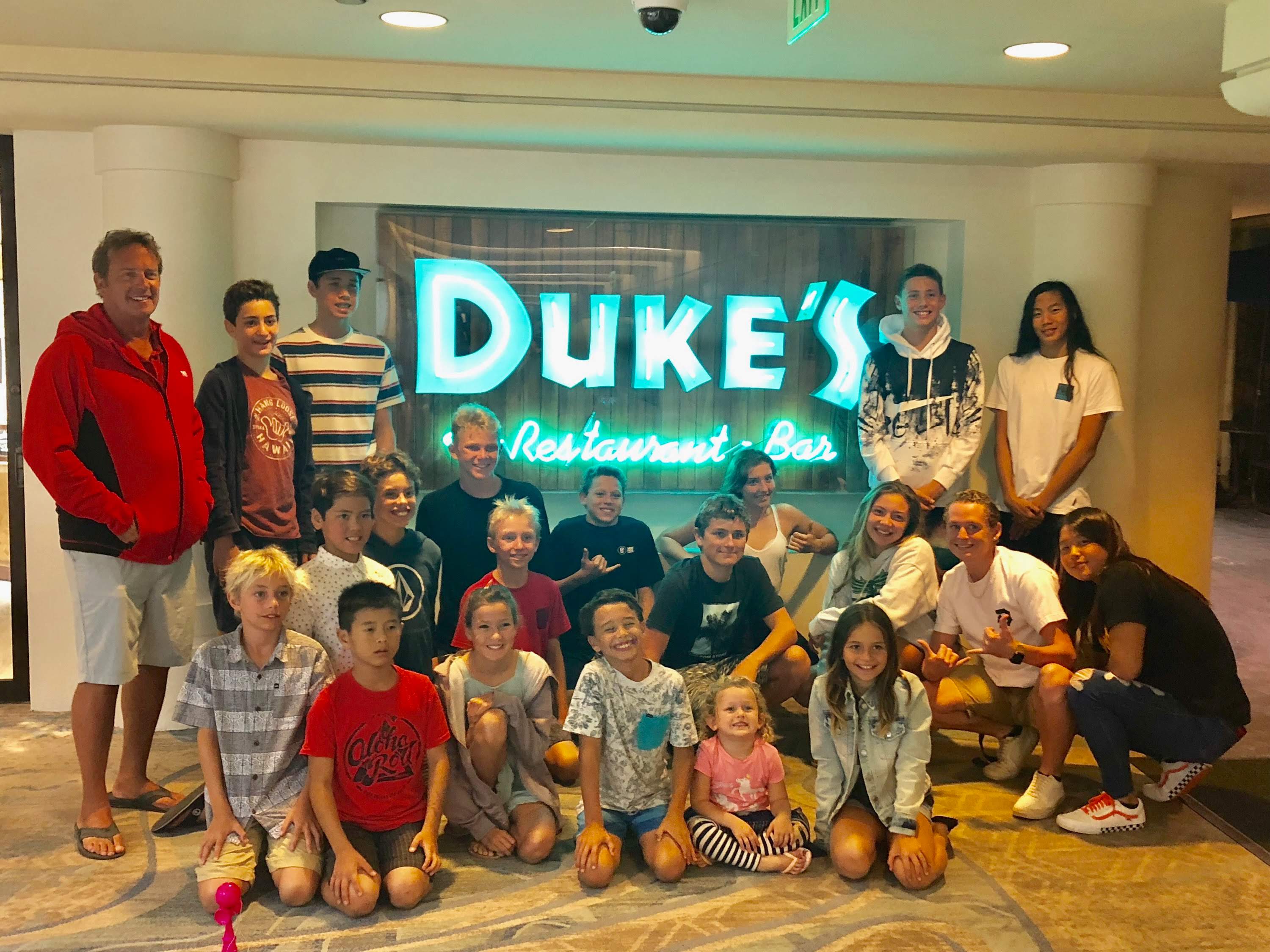 Lahaina Swim Club celebrates at Duke's restaurant in Oahu after successfully competing in Hawaii State Championships 